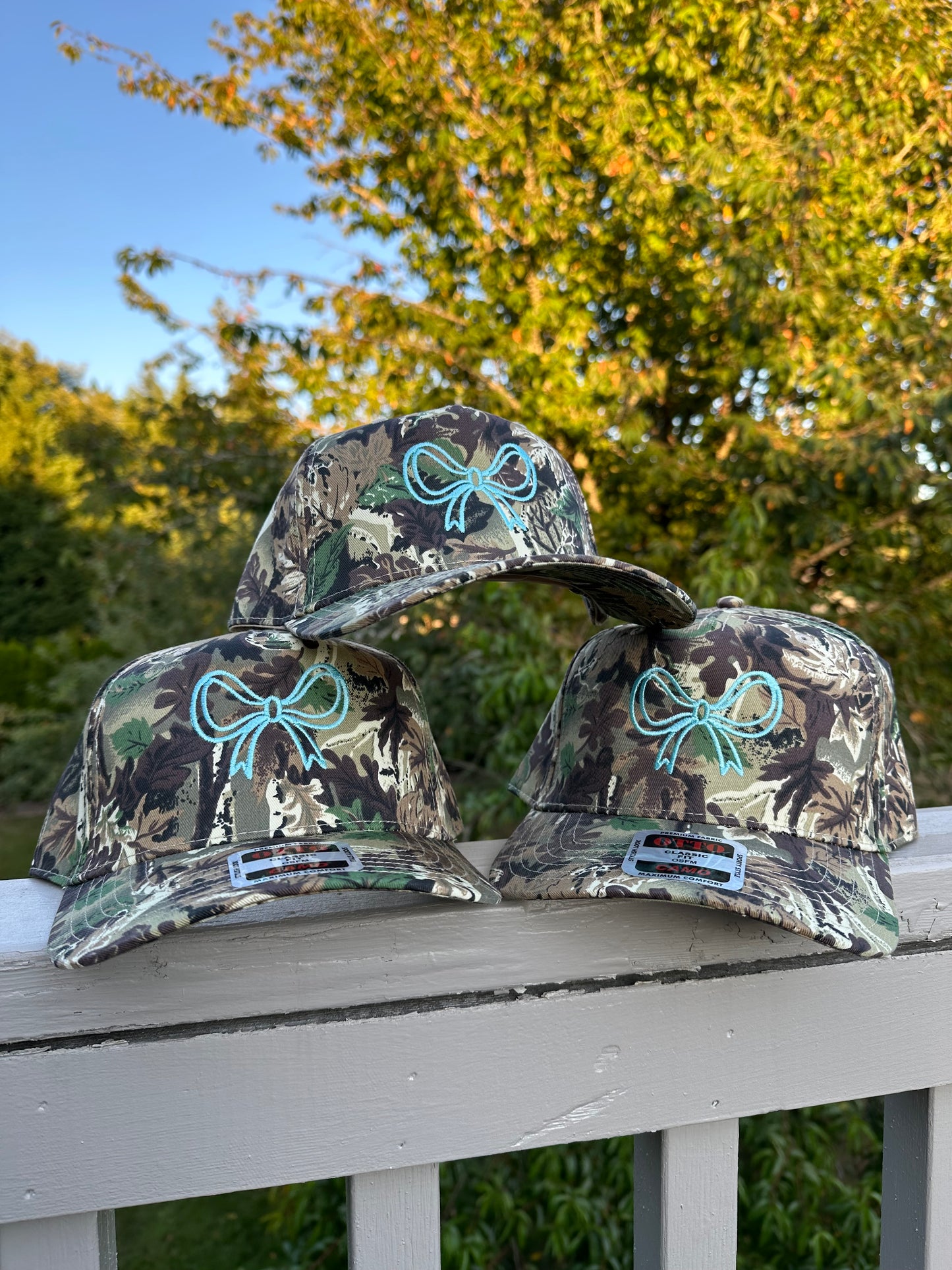 Turquoise bow embroidered trucker hat!