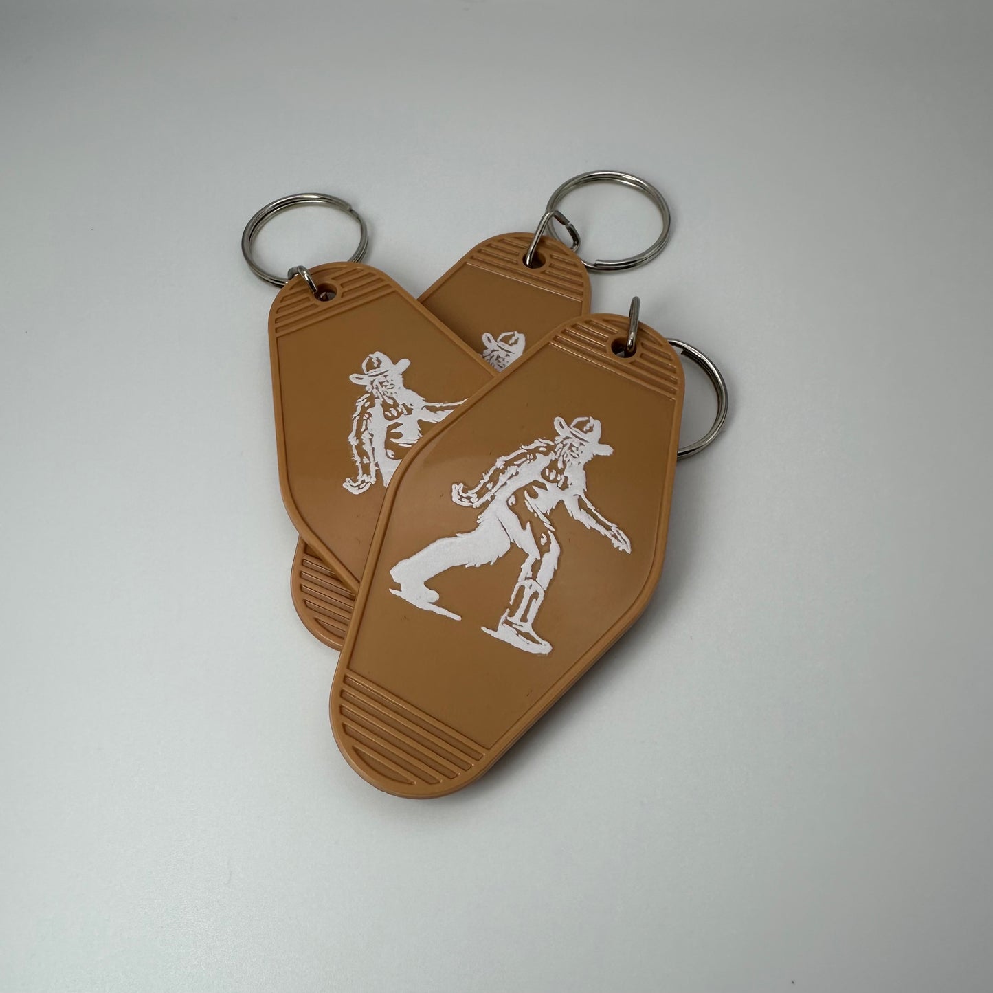 Cowboy Bigfoot motel keychain | western keychain