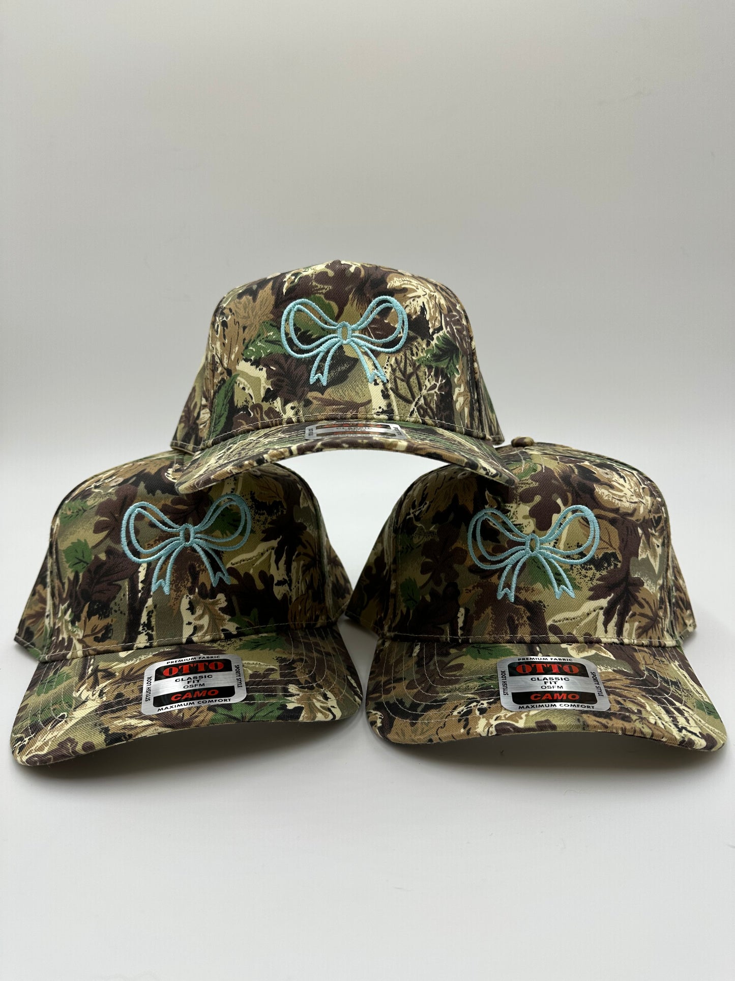 Turquoise bow embroidered trucker hat!