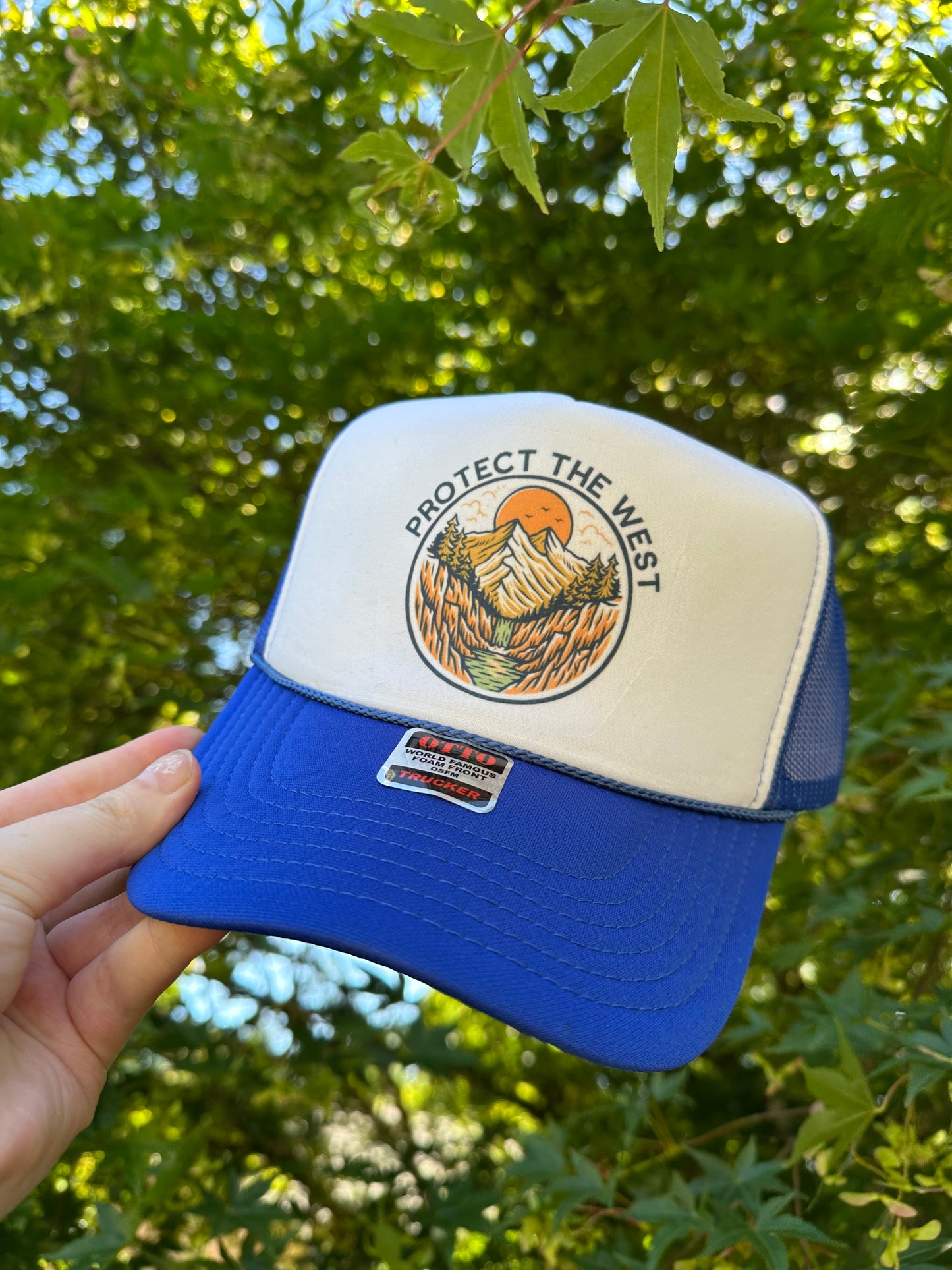 Protect the west trucker hat
