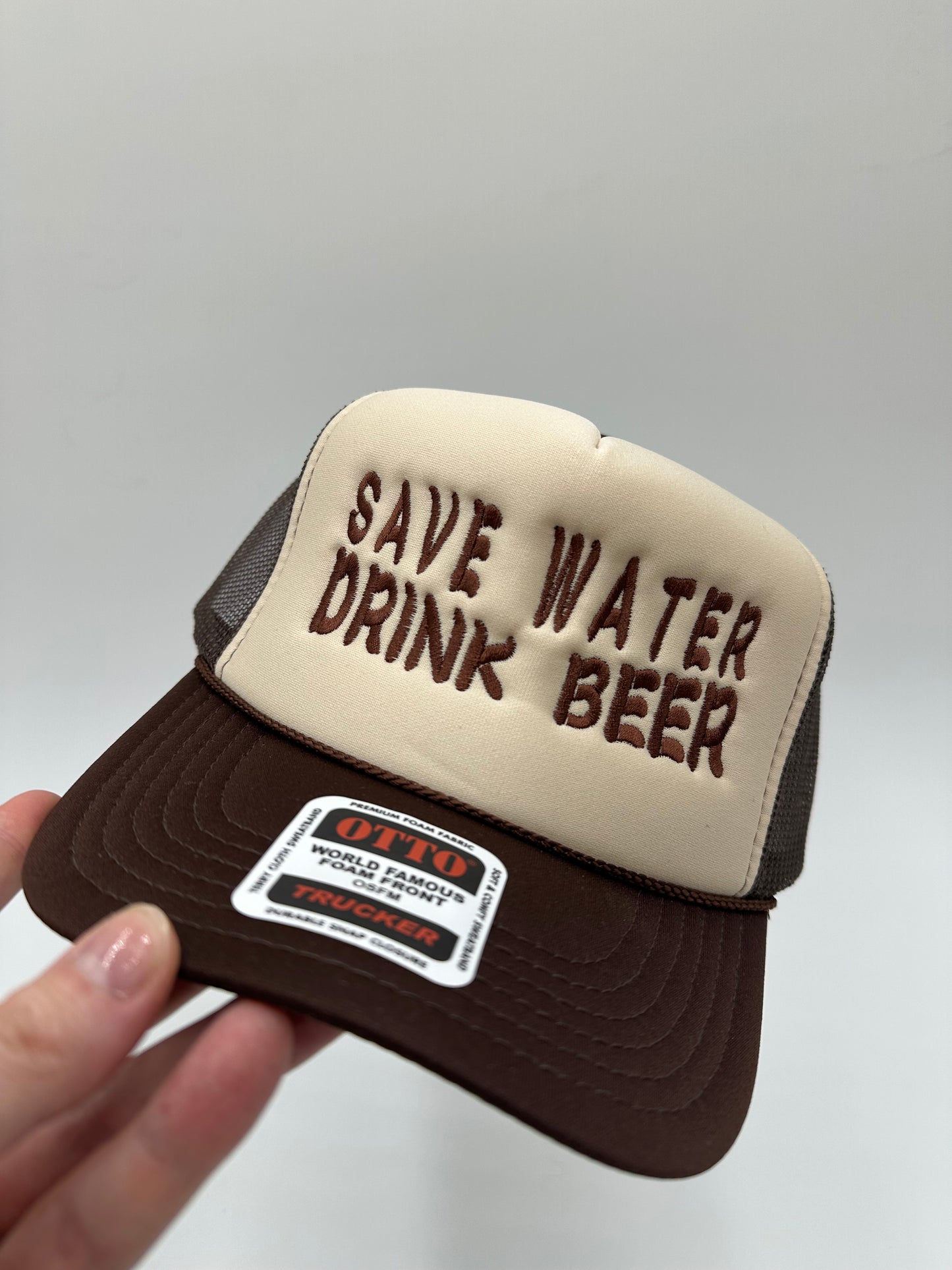 Save water drink beer embroidered trucker hat!