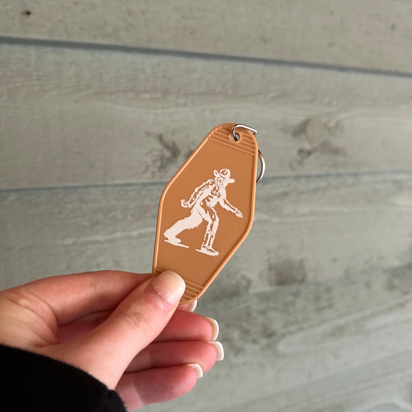 Cowboy Bigfoot motel keychain | western keychain