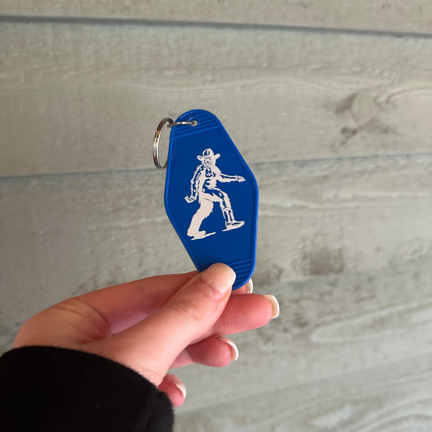 Cowboy Bigfoot motel keychain | western keychain