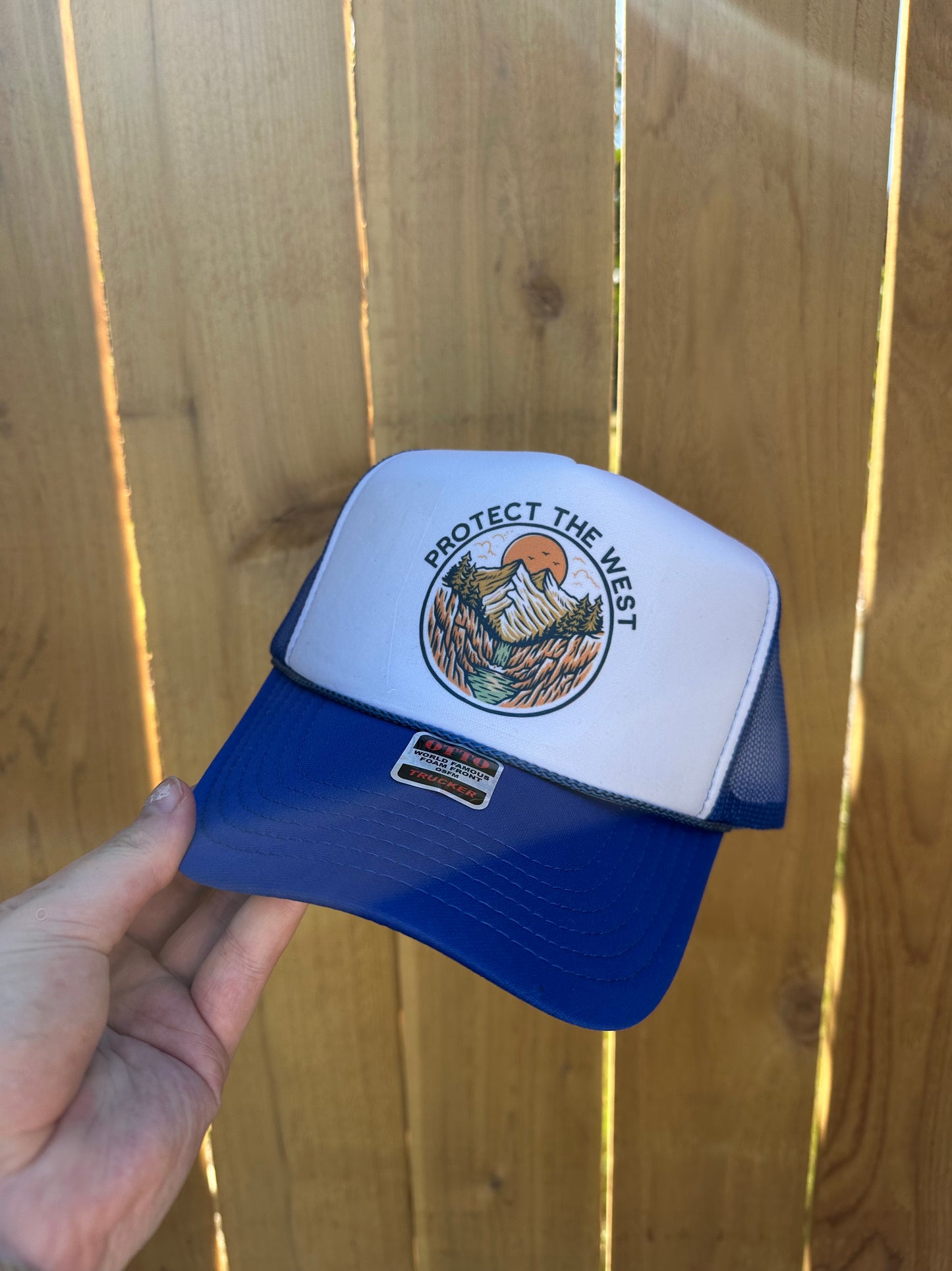 Protect the west trucker hat