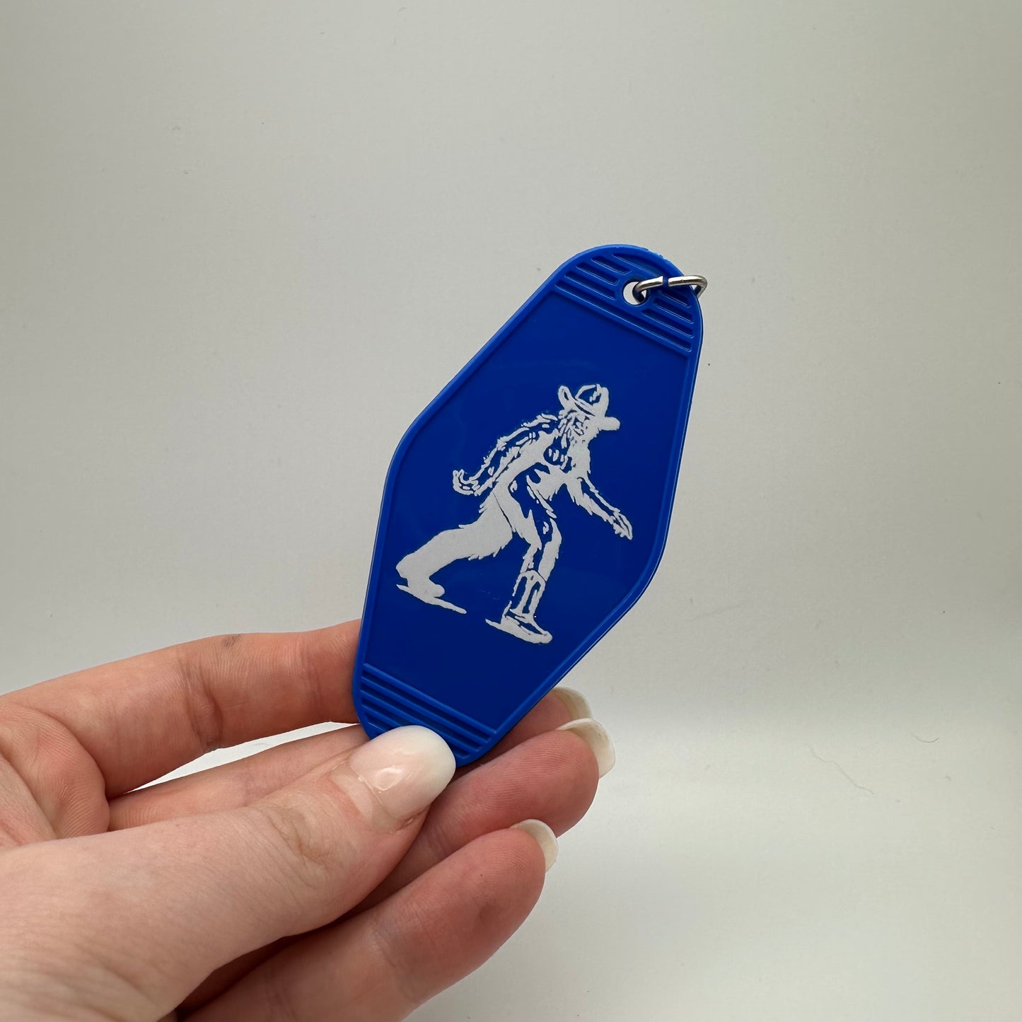 Cowboy Bigfoot motel keychain | western keychain