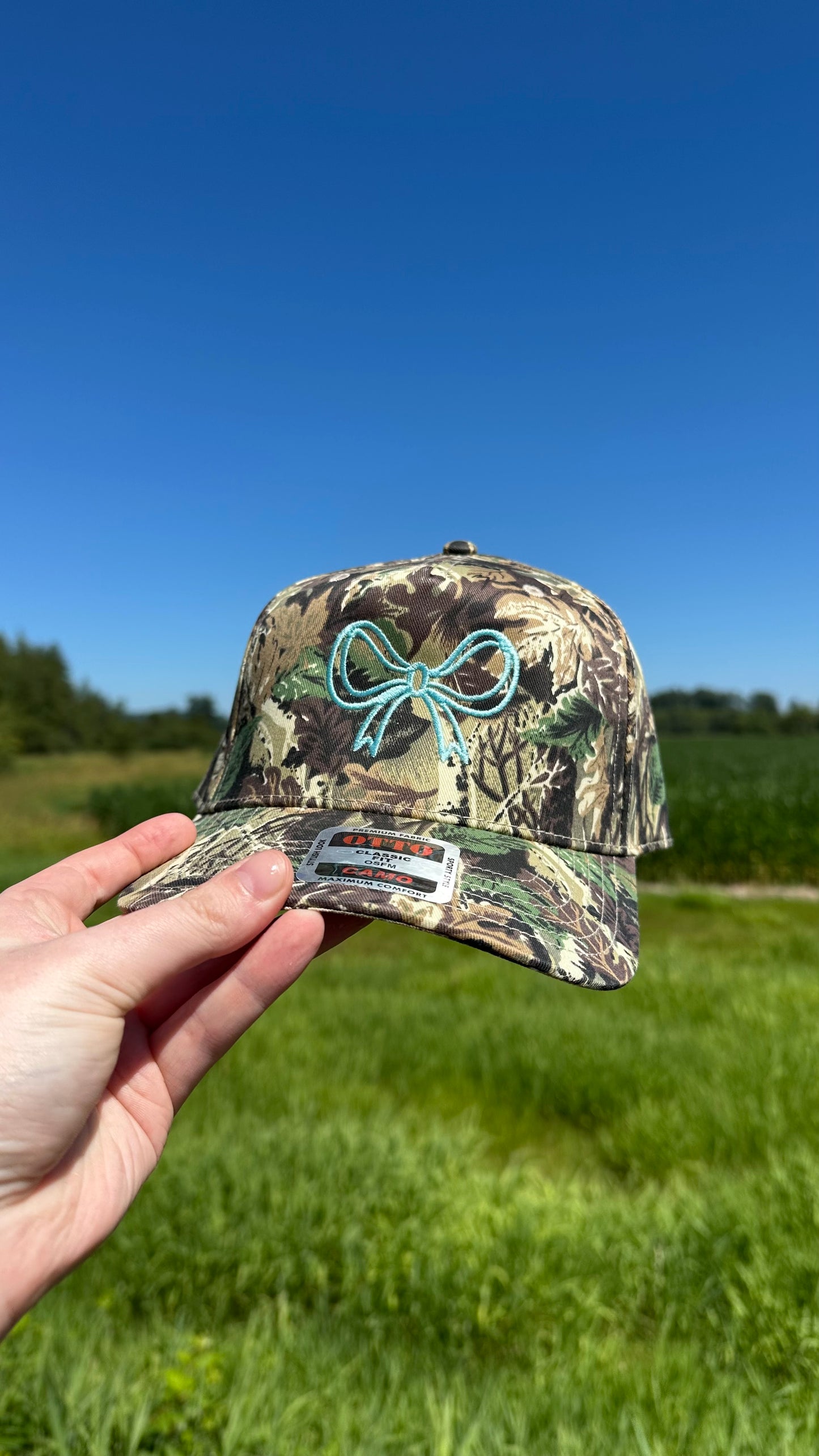Turquoise bow embroidered trucker hat!