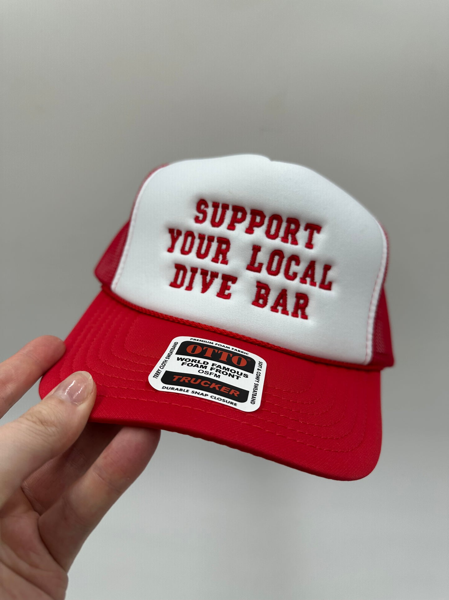 Support your local dive bar embroidered trucker hat!