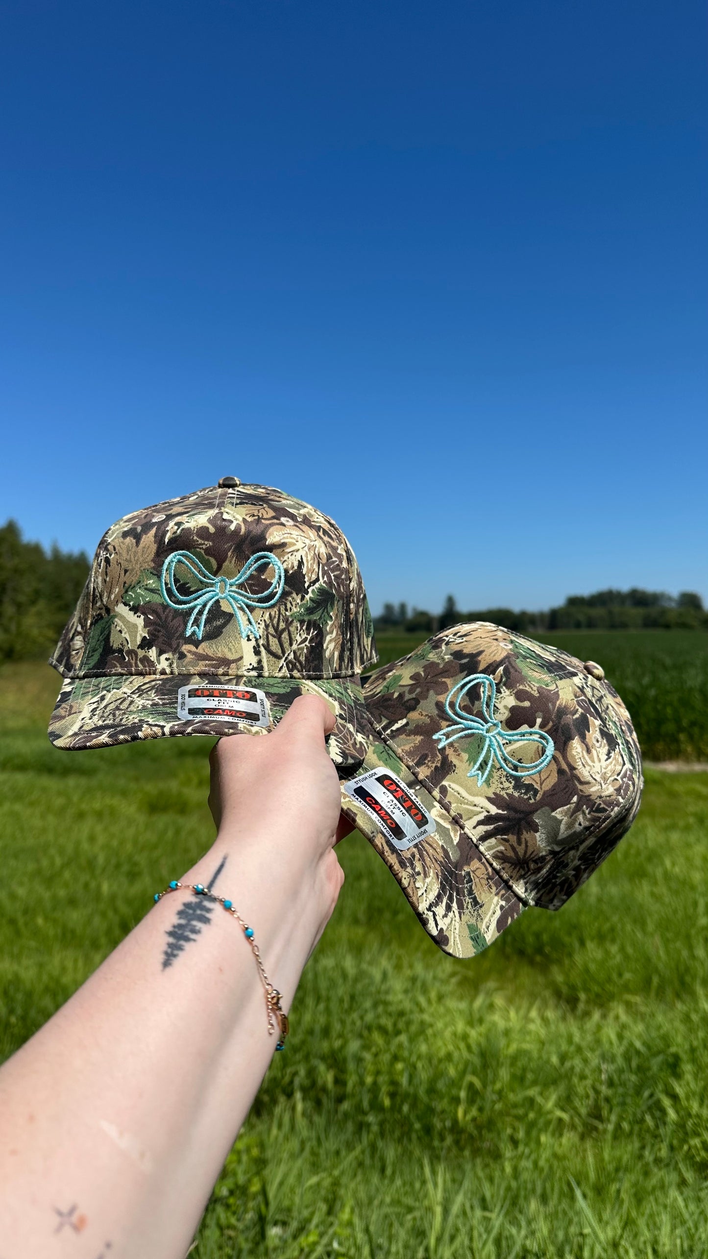 Turquoise bow embroidered trucker hat!