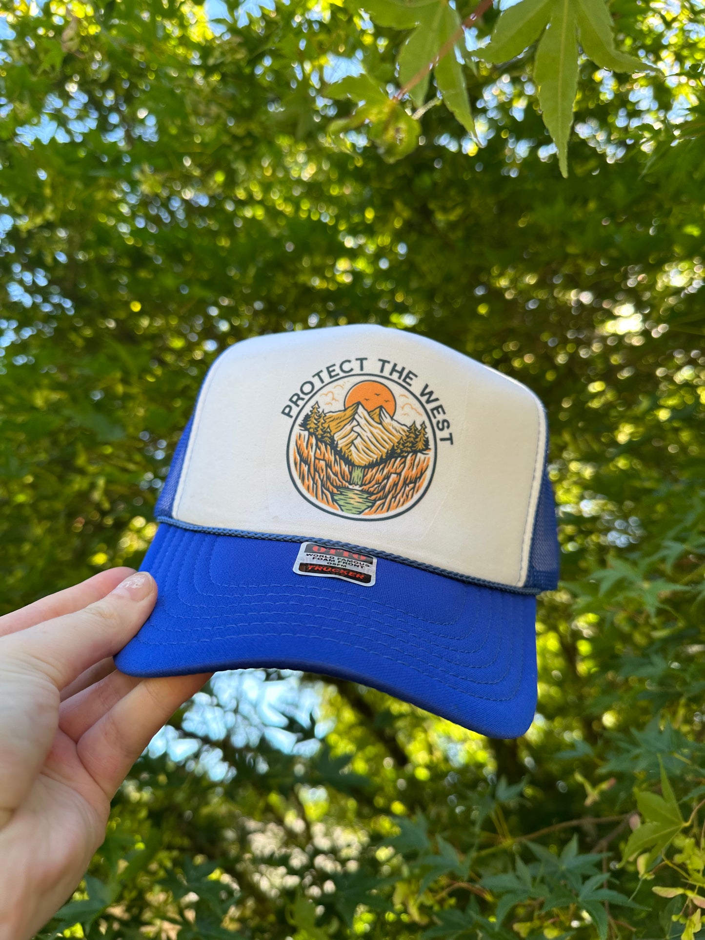 Protect the west trucker hat